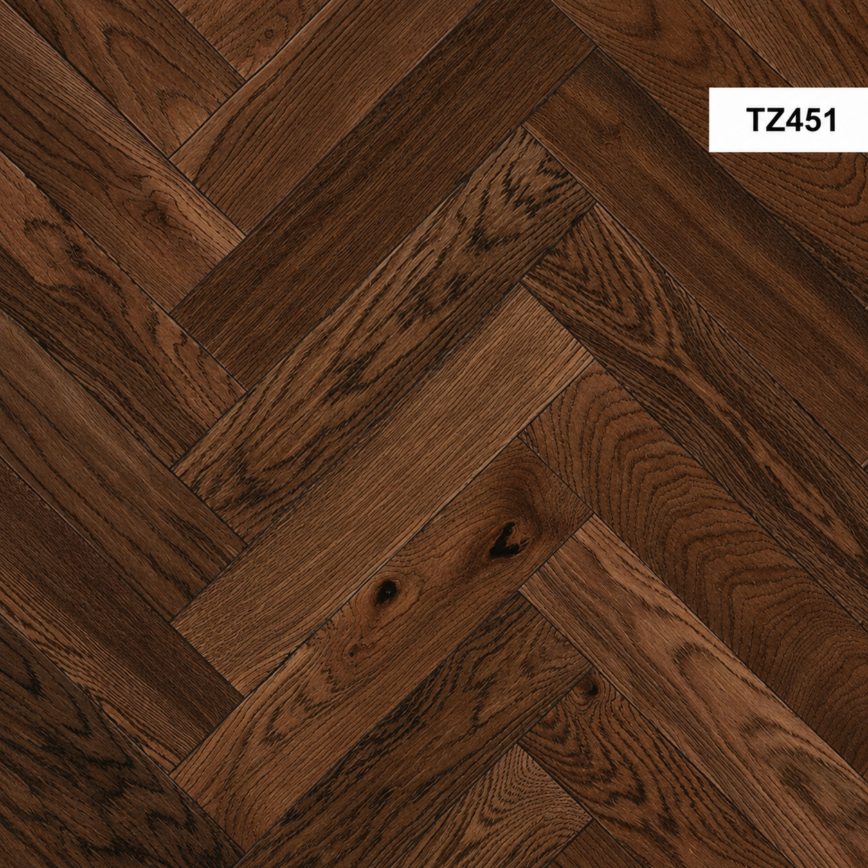 Dark brown wood flooring planks arranged in a herringbone pattern, with a small white label in the top right reading TZ451.