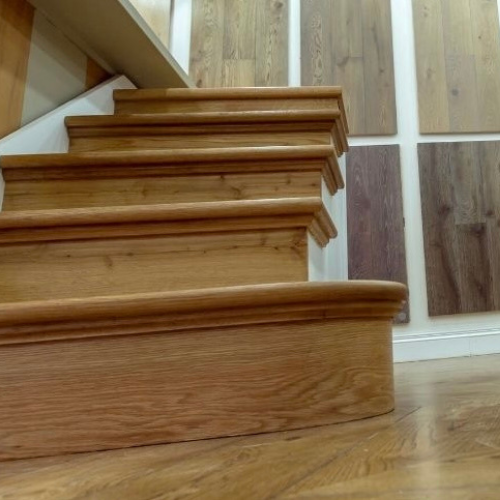 Modern wood flooring design in natural oak for a contemporary living room